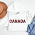 Say hello to the Oh-Canada Hoodie, featuring "Canada" in bold red and black plaid lettering that screams “I’m Canadian, and yes, I’m cozy!”